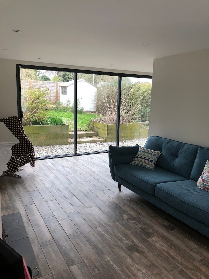 Living room renovation with bi-fold doors